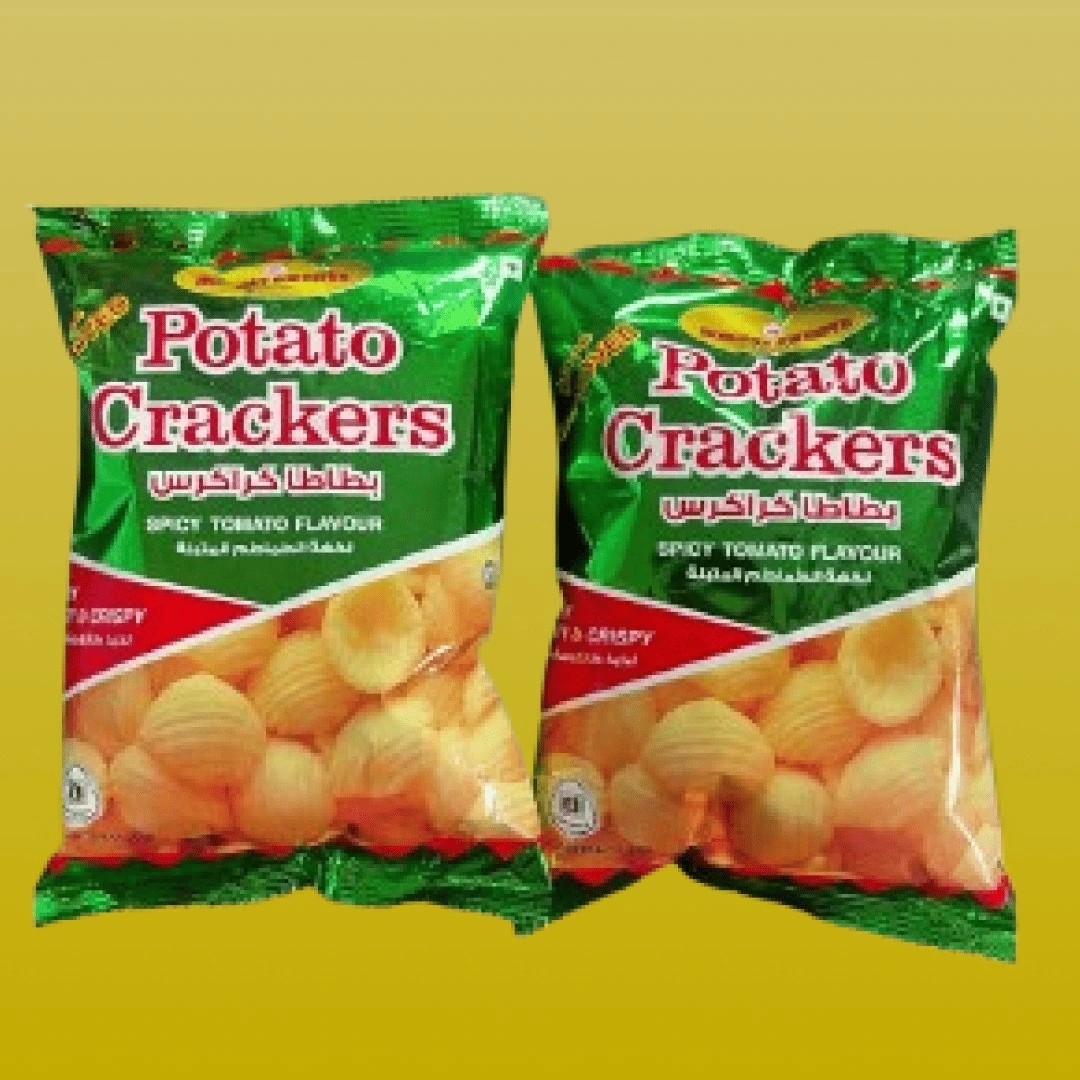 bombay-sweets-spicy-tomato-potato-crackers Two green packages of Bombay Sweets Spicy Tomato Potato Crackers, a crispy Bangladeshi snack.