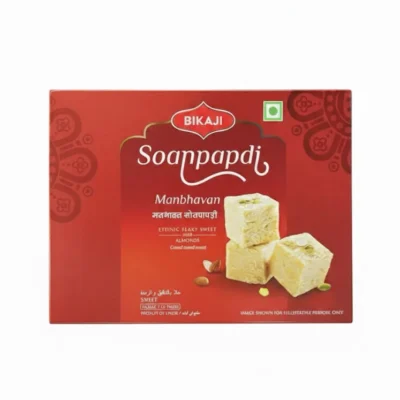 Bikaji Manbhavan Soanpapdi (Flaky Sweet) with almonds and pistachios, front view of red box.