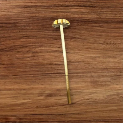 Overhead view of wooden Dal Ghotni on a brown wooden surface